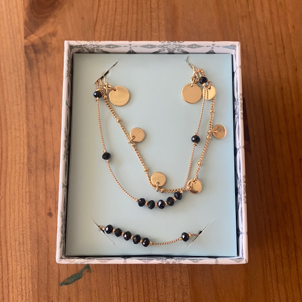 Brand new earrings, bracelet, and necklace set
